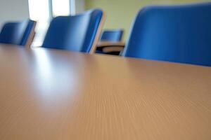 A conference table with blue chairs photo