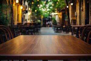 An empty table in a restaurant with chairs photo