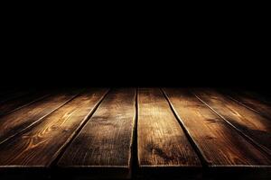 Wooden table with black background photo