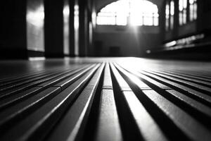 Black and white photograph of a long hallway photo