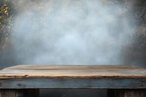 An empty wooden table in front of a dark background photo