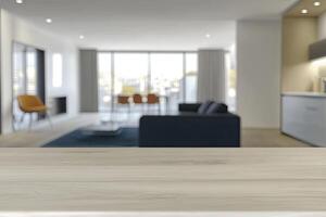 An empty table in front of a living room photo