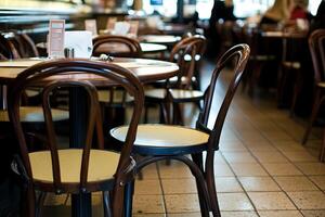 A restaurant with a table and chairs photo