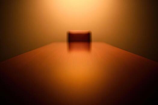 A table with a chair in the middle of it photo