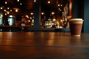A coffee cup sitting on a table in a restaurant photo