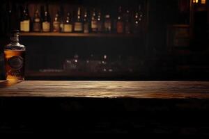 A bottle of whiskey sits on a wooden table photo