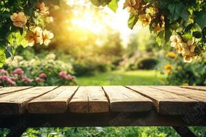 Wooden table in the garden with sun shining through the trees photo