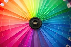 A close up of a color wheel with a rainbow in the center photo