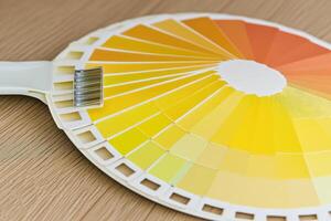 A color wheel with a paint sample on top photo