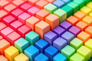 A colorful pile of blocks with different colors photo