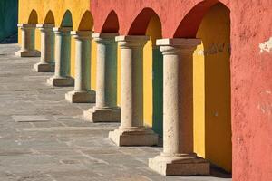 Colorful columns in a row of colorful buildings photo
