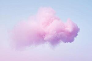A pink cloud floating in the sky photo