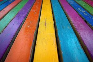 A close up of a colorful painted bench photo