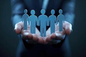 Hands holding a group of people photo