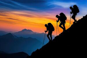 Hikers ascend a mountain at sunrise photo