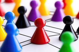 Diverse group of colorful figures interconnected photo