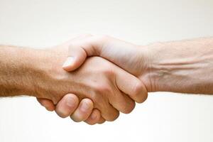 Two hands shaking in agreement photo