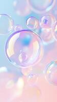 Colorful soap bubbles in various sizes float against a The pink background. soft bubbles display shades of blue, pink, and clear reflections. photo