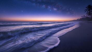 Serene Beach Waves at Twilight Under a Starry Night Sky photo