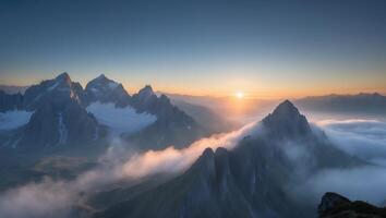 Majestic Mountain Peaks Emerging From Cloud Inversion at Stunning Sunrise photo
