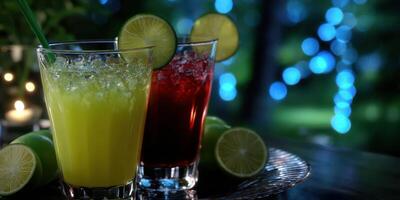 Refreshing cocktails served at a summer evening gathering with colorful lights and fresh limes photo