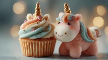 Colorful unicorn cupcake and plush toy create a whimsical dessert scene for celebrations photo