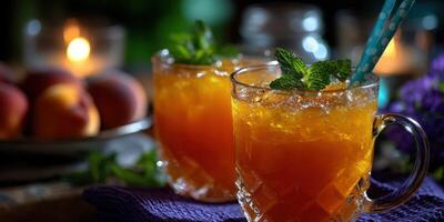 Refreshing iced tea served with mint and peaches in a cozy, dimly lit setting photo
