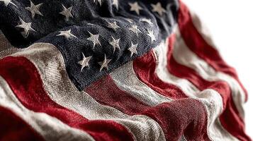 Old and weathered American flag waving gently in the breeze, symbolizing patriotism and national pride in a serene outdoor setting photo