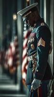 Soldier stands guard during solemn ceremony with flags in the background at historic location photo