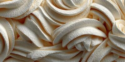 Creamy textured swirls of dessert topping showcased in a close-up view with soft, inviting colors photo