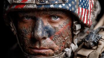 Soldier with painted face showing determination and focus during military training in a rugged environment photo