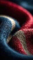 Fabric in close-up showcasing intricate textures and colors under soft lighting photo