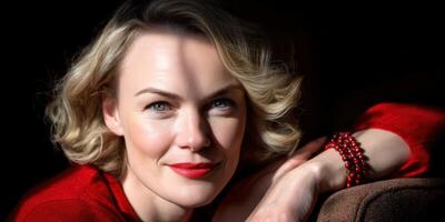 Charming woman poses with elegance in warm lighting and rich color tones photo