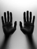 Hands reaching out with a blurred background in a minimalistic style photo