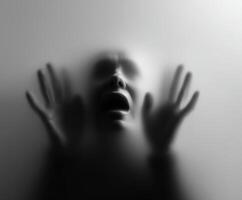 Expression of anguish in a foggy atmosphere captured in black and white photo