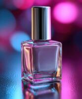 Colorful nail polish bottle on glossy surface with blurred background lights photo