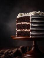 A piece of chocolate cake on a wooden stand photo