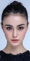 Close up of a beautiful woman with dark hair and brown eyes photo
