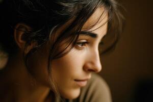Portrait of a young woman looking down thoughtfully photo