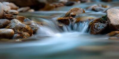 Flowing stream cascading over rocks in Great Smoky Mountains photo