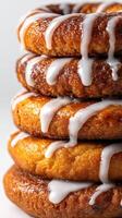 Stack of delicious fresh donuts with drizzled glaze closeup photo