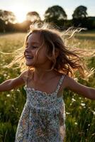 Little girl runs happily through a grassy field in Summertime photo