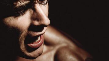 Man with intense expression shouting during dark afternoon photo