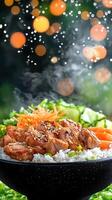 Bowl of tasty teriyaki chicken on rice with carrots and cucumbers with bokeh background for food blog photo