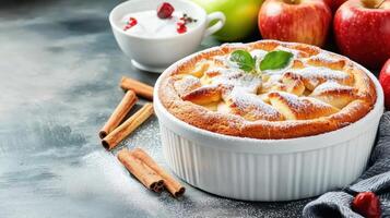 Dessert baking Apple cake with cinnamon and sugar served on rustic tabletop with fruit photo
