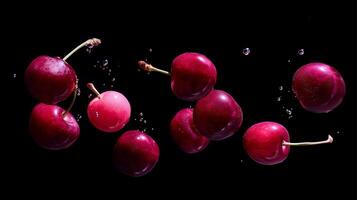 Fresh cherries splashing through water droplets in dark setting create a vibrant display of nature's sweetness photo