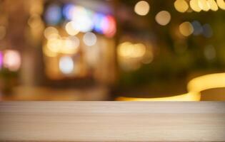 Empty table top and blur of restaurant background selective focus product display photo