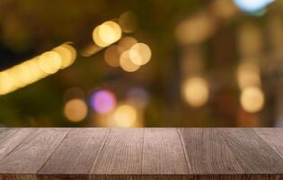 wood table and blur of restaurant background selective focus product display photo