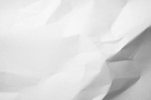 a black and white photo of a crumpled piece of paper