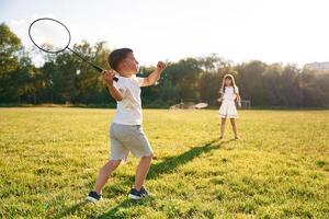 Happy, kids are on the summer field photo